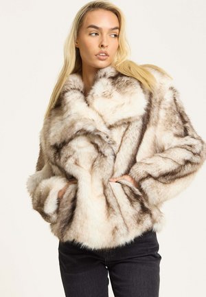 Faux fur coat in cream and brown tones with a voluminous, textured design. Features a shawl collar and side pockets.