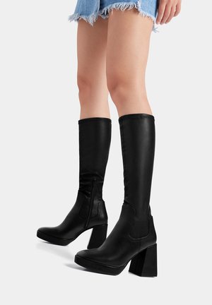 High heeled boots - black