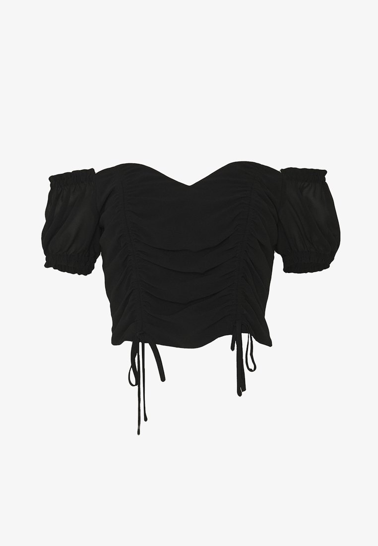 Blouse noire courte à manches bouffantes, dotée de fronces et de liens réglables à l'ourlet pour un ajustement près du corps. Texture lisse.