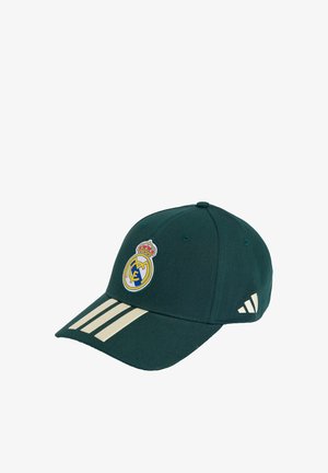 Gorra de béisbol verde oscuro con logo del Real Madrid en el centro frontal y tres franjas beige en la visera y lateral, hecha de tela.