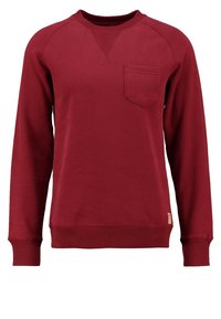 Viininpunainen collegepaita, jossa on pitkät hihat, pyöreä pääntie ja rintatasku edessä. Valmistettu pehmeästä kankaasta, jossa on resorit hihansuissa ja helmassa.