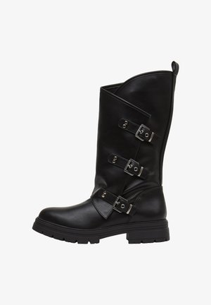 Black leather knee-high boot with three adjustable silver buckles on the outer side, textured finish, and a chunky rubber sole.