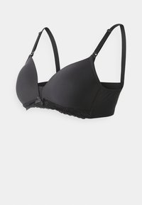 Black bra with a smooth, matte finish, featuring lace trim along the bottom and adjustable straps. Triangular cups for support.