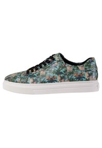 Patterned sneakers with a green and blue design featuring tropical plants and architectural details. White rubber sole, black laces.