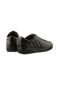 Black quilted leather sneakers with a textured finish, flat rubber sole, and lace-up design. Features pull tab on heel for easy wear.