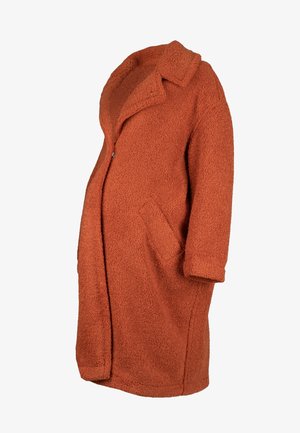 Oranje, fleece-achtige jas met een sjawl kraag, lange mouwen en twee zijzakken. Knielange snit met een comfortabele pasvorm.