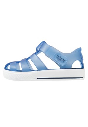 Blaue Gummisandalen mit mehreren horizontalen Riemen und einer verstellbaren Schnalle. Mit weißer Sohle und "igor"-Logo an der Seite.