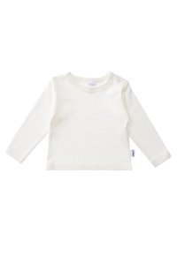 Weißes langärmliges Baumwollhemd mit rundem Halsausschnitt und zwei Druckknöpfen an der Schulter. Verfügt über ein kleines Markenetikett am Saum.