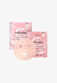 Deux designs d'emballage rose pour les masques en feuille STARSKIN Camellia, avec un compte-gouttes pour l'huile et un texte détaillant les étapes d'utilisation et les avantages.