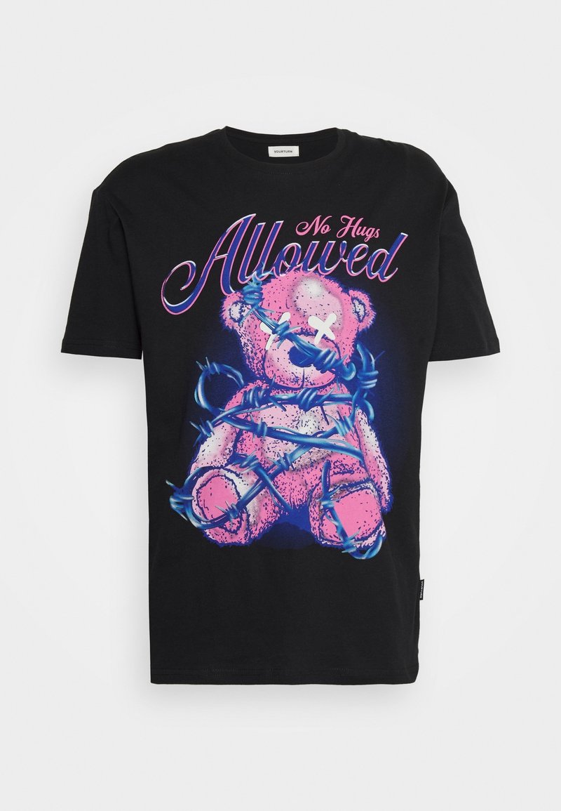 Black t-shirt with a pink teddy bear wrapped in blue barbed wire and text "No Hugs Allowed" in pink and purple above the bear.