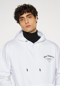 274 WORLD WIDE HOOD - Camisola - white