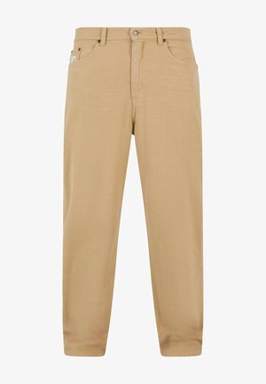 Beežid puuvillased püksid sirge lõikega, millel on tõmblukk, viis taskut ja diskreetne õmblustäpsus. Sile tekstuur ja klassikaline disain.