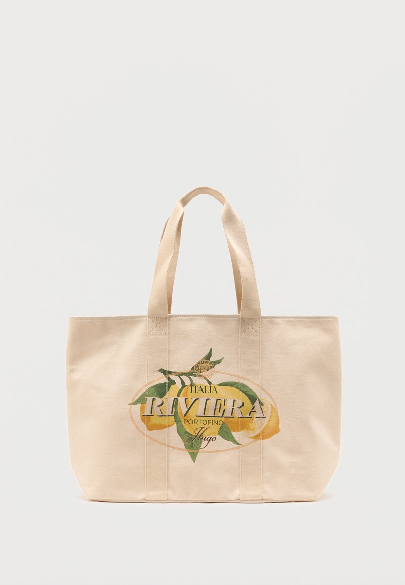 Sac fourre-tout en toile beige avec deux poignées, présentant un motif de branche de citron et le texte « Italia Riviera Portofino Hugo » sur le devant.