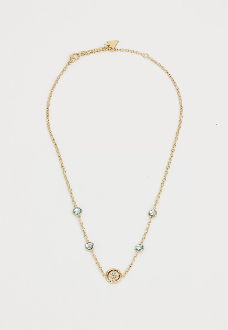 Gull lenke halskjede med runde blå edelstener og en sentral blomst pendant. Delikate lenker med polert finish som viser glitrende detaljer.