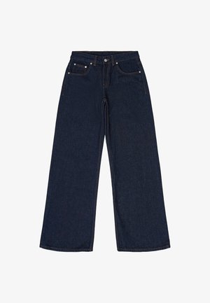 Ciemnoniebieskie dżinsy o szerokich nogawkach. Posiadają pięć kieszeni, szlufki na pasek oraz kontrastowe pomarańczowe przeszycia. Brak wzorów i ozdób.