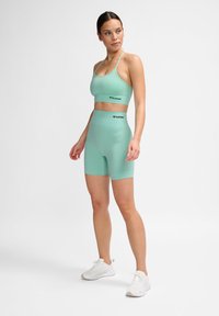 Hummel SEAMLESS - Tights - ocean wave