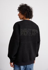 Carhartt WIP COORDINATE  - Suéter de forro polar - black/grey