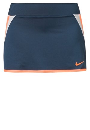 Granatowa spódnica sportowa z pomarańczowym obszyciem, białymi panelami bocznymi oraz pomarańczowym logo Nike na dolnej prawej stronie.