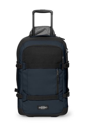 Sort og mørkeblå Eastpak rejsetaske på hjul med teleskophåndtag, frontlynlåslomme, sidestropper og logopatch nederst.