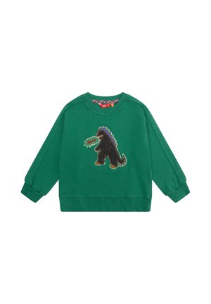Groene sweatshirt met een textured Godzilla patch die een tekstballon vasthoudt met "ONLY." Ribgebreide manchetten en halslijn maken het ontwerp af.