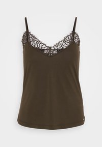 Mörk olivgrön linne med spetsdetaljer vid halsringningen, justerbara band och en mjuk, slät textur. Lätt tyg, avslappnad passform.