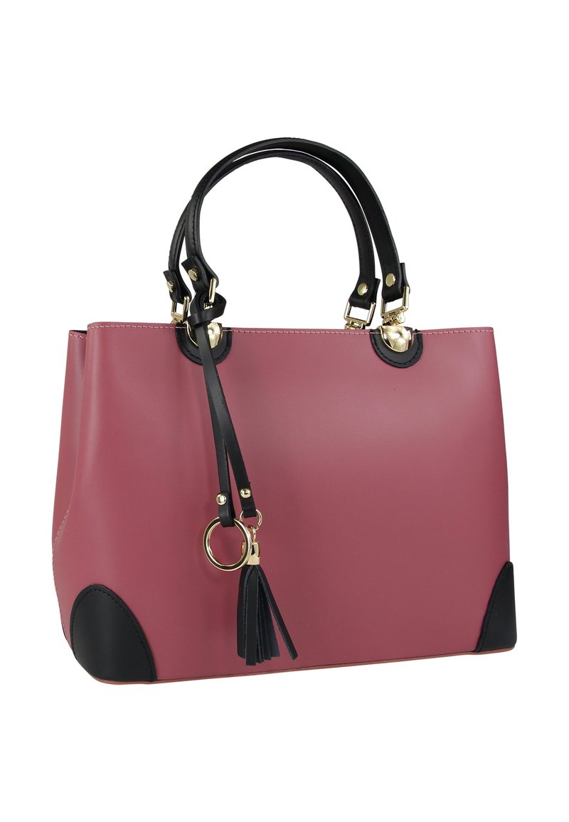 Roze synthetische handtas met zwarte accenten, twee korte handvatten, gouden metalen elementen en een afneembare tassel aan een zijring.