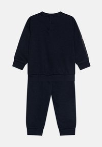 Champion RETRO SPORT CREWNECK SUIT UNISEX SET - Ikdienas džemperis - dark blue