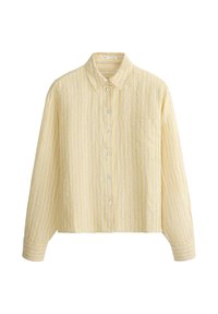 Chemise jaune à manches longues avec fines rayures verticales blanches et grises et une seule poche poitrine.