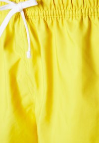 Nike Sportswear M NSW SPE WVN LND FLOW SHORT - Calças de fato de treino - vivid sulfur/white