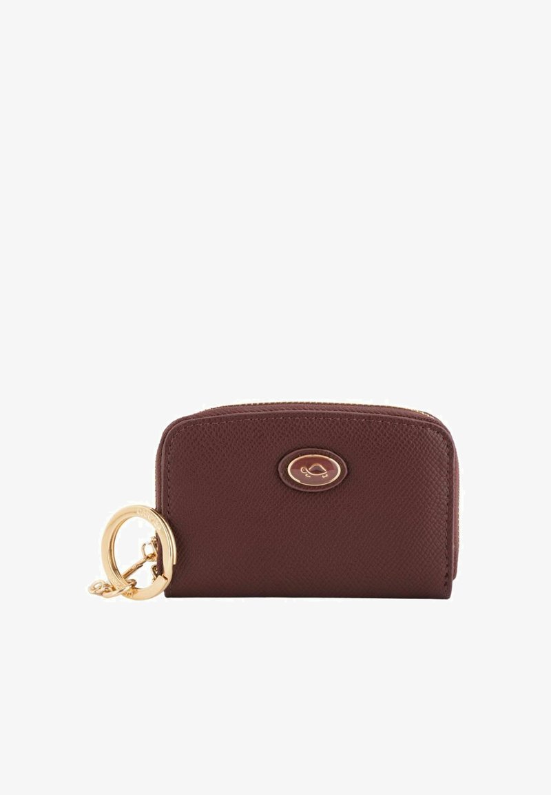 Brown leather wallet with textured surface, gold hardware ring, and logo accent. Zipper closure at the top, compact rectangular shape.