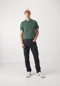 Lacoste Pólóing - vert fonce