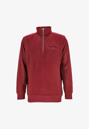 Herren Langarm-Pullover in Bordeauxrot mit gerippten Bündchen, hohem Reißverschlusskragen und kleiner, geknöpfter Brusttasche.