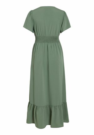 Világoszöld, midi hosszúságú ruha rövid ujjakkal, elasztikus derékrésszel és fodros szegéllyel, fehér háttéren hátulról bemutatva.