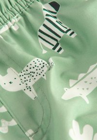 Produktbild von Next REGULAR FIT - PRINTED - Badeshorts - Black White Graffiti/grau