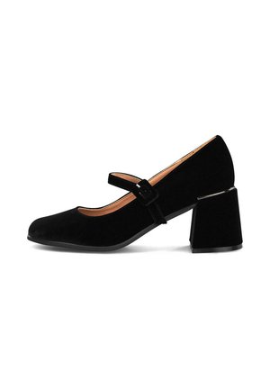 Zapato Mary Jane de ante negro con puntera redonda, correa ajustable y un tacón cuadrado grueso. Textura suave y detalles de diseño mínimos.
