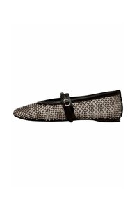 Black and white flat shoe with mesh fabric featuring a patterned design, rounded toe, and a black strap across the instep with a metal buckle.