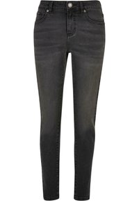 Pantalones vaqueros skinny de mezclilla negra con cinco bolsillos, cremallera frontal y cierre de botón; textura ligeramente desgastada con un acabado suave.