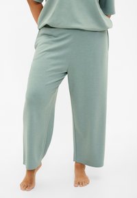 Zizzi 7/8- AUS MIX MIT TASCHEN - Spodnji deli trenirk - chinois green