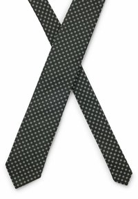 Black tie with a textured pattern featuring small white squares, pointed ends, and a smooth finish. Fabric appears woven and structured.