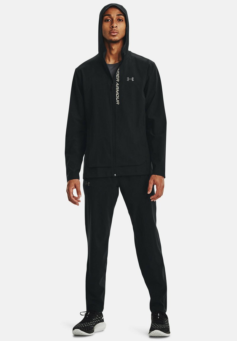 Under Armour OUTRUN THE STORM Tracksuit bottoms black