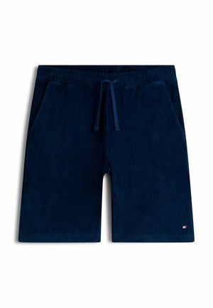 Mørkeblå terry stof shorts med elastisk taljebånd, snøre, sidelommer og lille logo nær kanten på venstre ben.