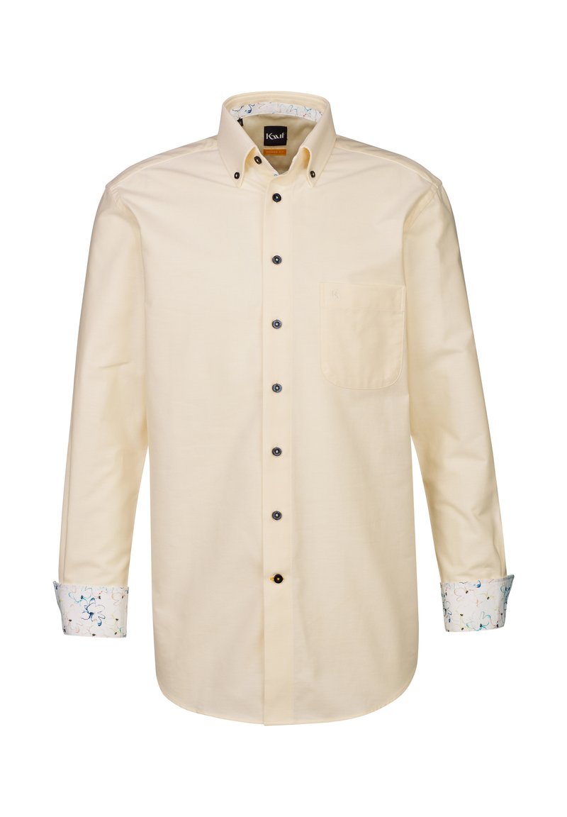 Hellgelbes langärmeliges Shirt mit einem Button-Down-Kragen, schwarzen Knöpfen und gemusterten Manschetten, die blaue, grüne und pinke Akzente aufweisen.