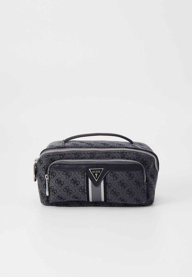 Geantă cosmetică de culoare bleu marin cu un model monogram, dotată cu un fermoar argintiu, o dungi verticale albe și un detaliu triunghiular cu logo în partea din față.