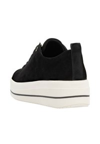 Baskets en nubuck noir avec une semelle en plateforme blanche, comprenant une semelle noire et des accents noirs subtils en ligne le long de la semelle.