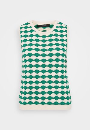 Roheline ja kreemjas lõngast kootud ilma varrukateta särk, millel on laineline muster. Kujunduses on ümar kaelus ja soonikkoes servad.