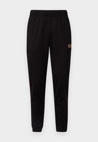 TRAIN CORE PANTS - Tracksuit bottoms - black