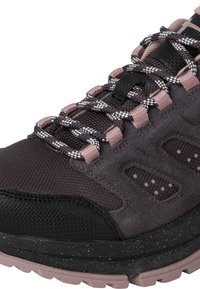 Black and pink hiking shoe with a textured suede and mesh upper, contrasting white-speckled midsole, and black and pink laces.