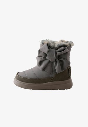Grauer Winterstiefel mit Kunstfellfutter und großer Stoffschleife an der Seite, mit gesteppten Details und dicker Gummisohle.