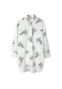 Camicia bianca con bottoni, decorata con stampa floreale nera, maniche lunghe, colletto e una vestibilità comoda con orlo curvo. Tessuto dalla superficie liscia.