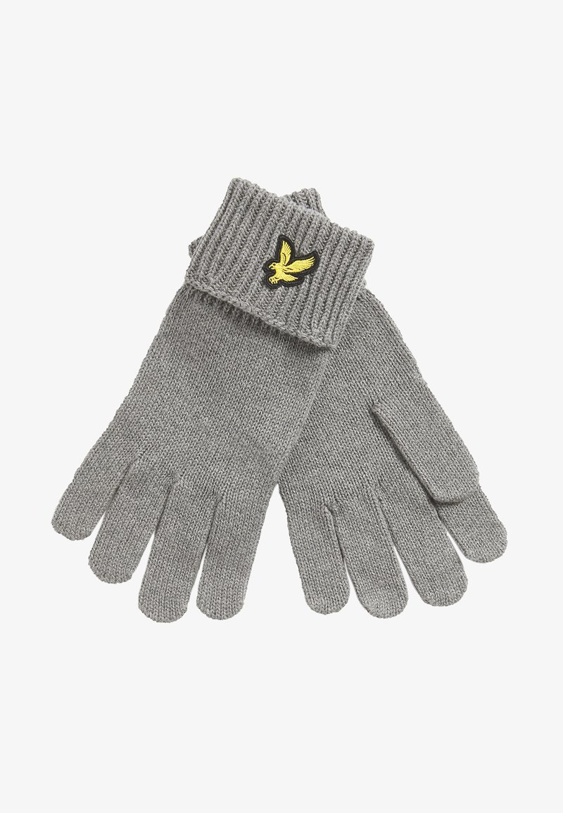 Paire de gants gris en tricot avec des poignets côtelés, présentant un petit emblème d’oiseau jaune sur un poignet.